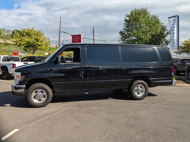 Photo of 2012 Black Ford E350 Super Duty