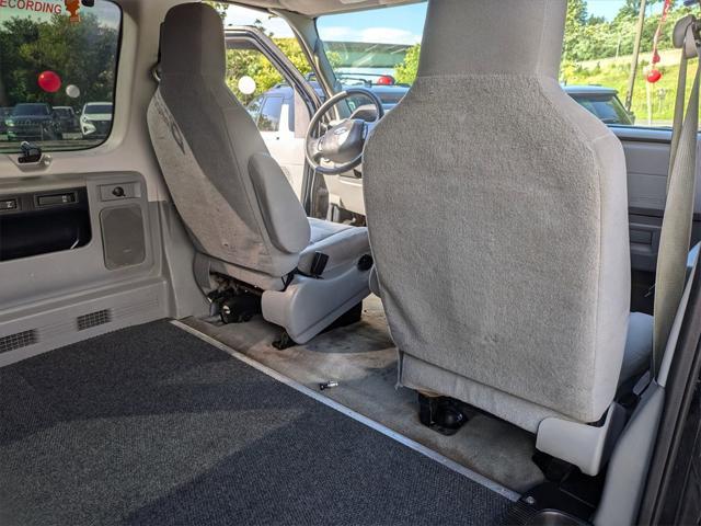 Photo of 2012 Black Ford E350 Super Duty