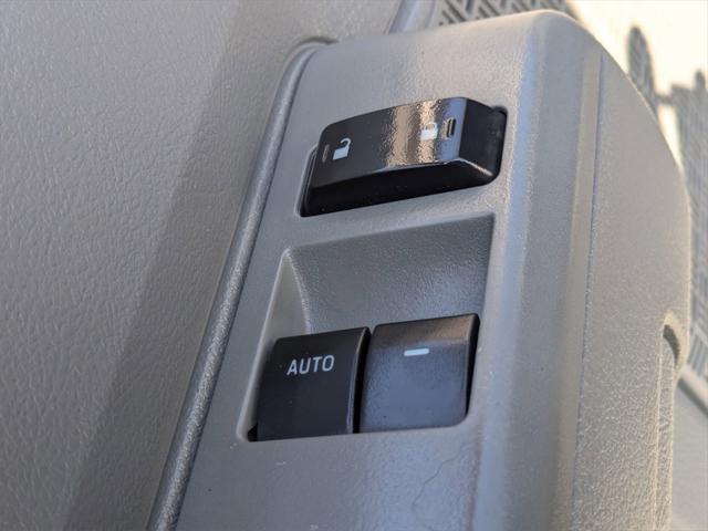 Photo of 2012 Black Ford E350 Super Duty
