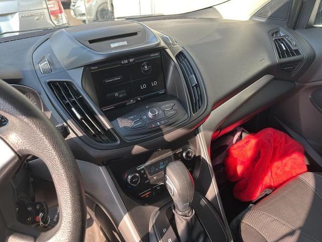 Photo of 2015 Ruby Red Metallic Tinted Clearcoat Ford Escape