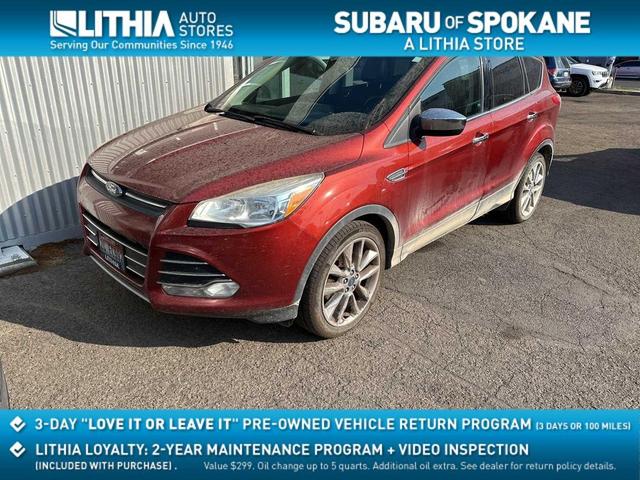 Photo of 2015 Ruby Red Metallic Tinted Clearcoat Ford Escape