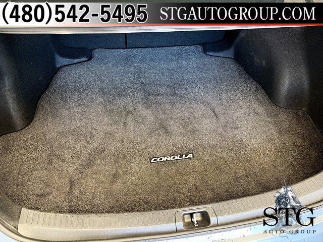 Photo of 2024 Celestite/Midnight Black Metallic Toyota Corolla