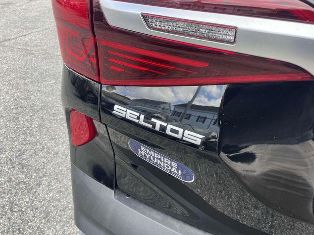 Photo of 2023 Cherry Black Kia Seltos