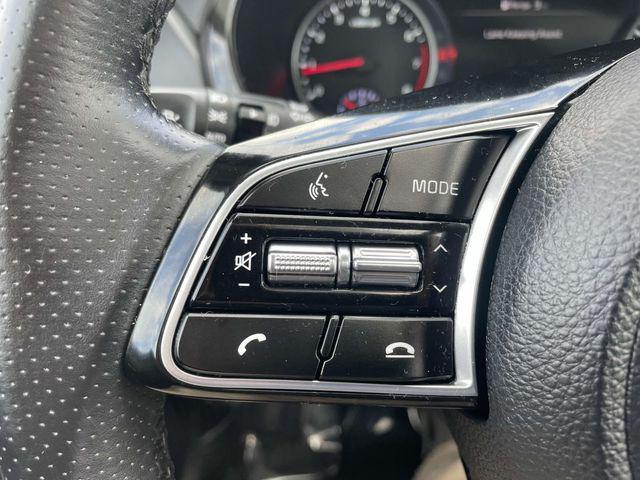 Photo of 2023 Cherry Black Kia Seltos
