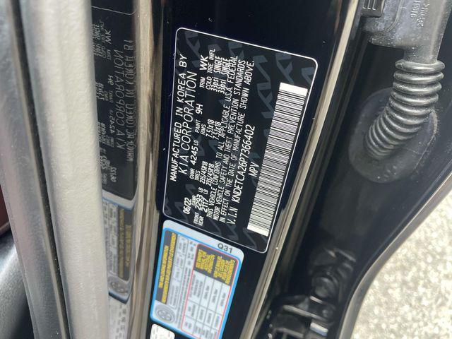 Photo of 2023 Cherry Black Kia Seltos