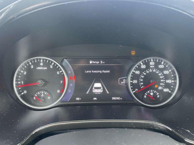 Photo of 2023 Cherry Black Kia Seltos