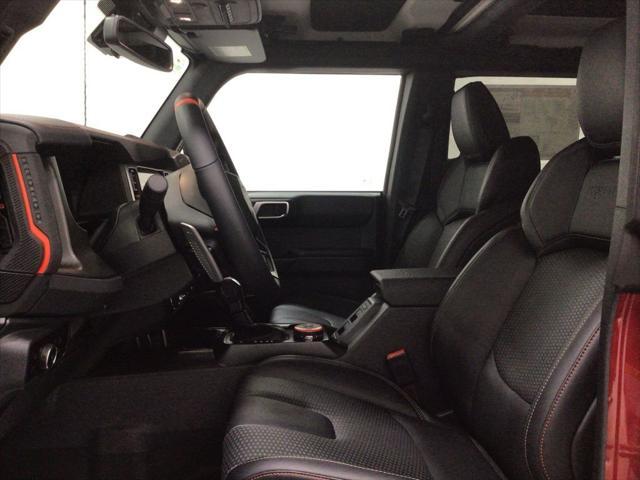 Photo of 2025 Ruby Red Metallic Tinted Clearcoat Ford Bronco