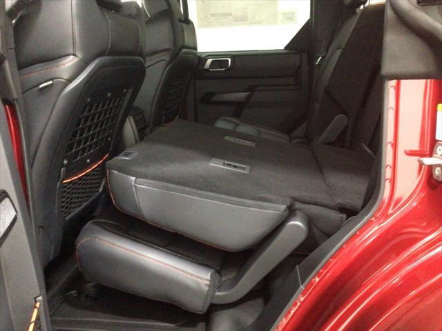 Photo of 2025 Ruby Red Metallic Tinted Clearcoat Ford Bronco