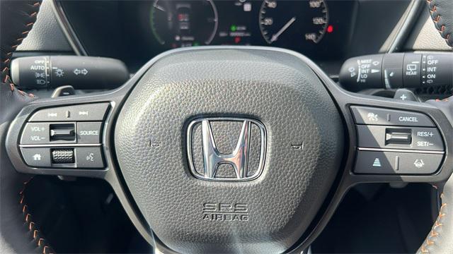 Photo of 2025 Platinum White Honda CR-V Hybrid