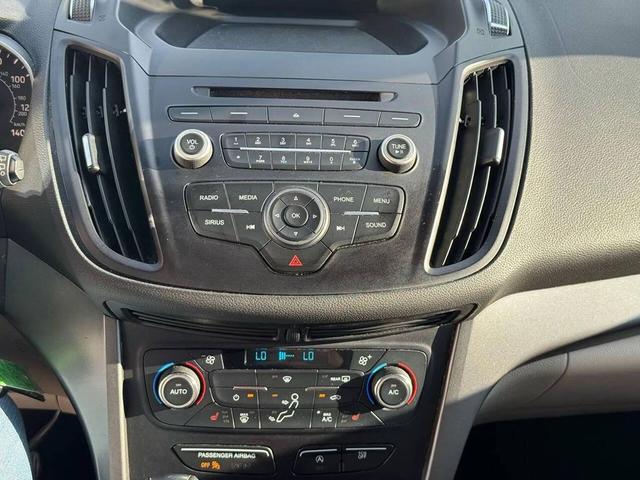 Photo of 2017 Ruby Red Metallic Tinted Clearcoat Ford Escape