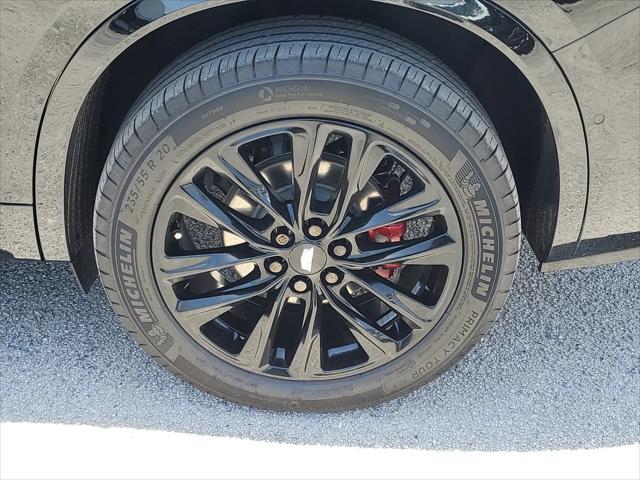 Photo of 2024 Stellar Black Metallic Cadillac XT6