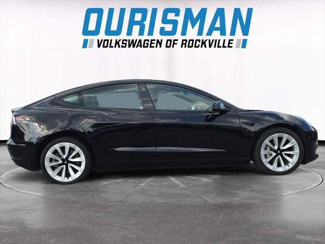 Photo of 2022 Solid Black Tesla Model 3