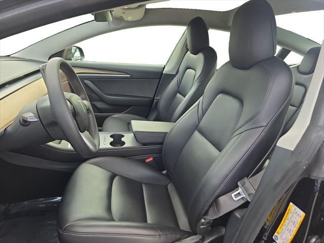 Photo of 2022 Solid Black Tesla Model 3