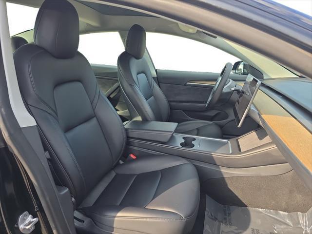Photo of 2022 Solid Black Tesla Model 3