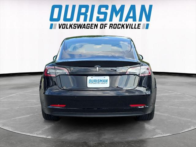 Photo of 2022 Solid Black Tesla Model 3