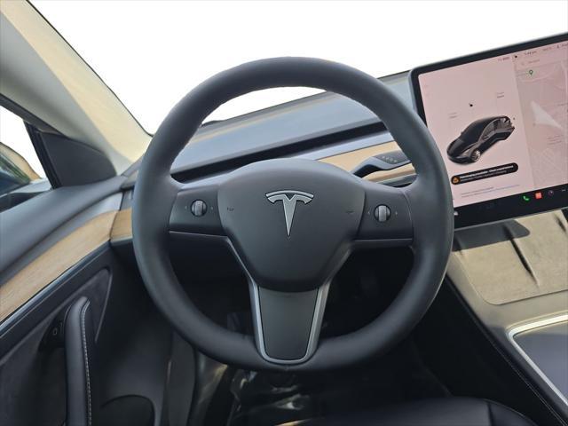 Photo of 2022 Solid Black Tesla Model 3
