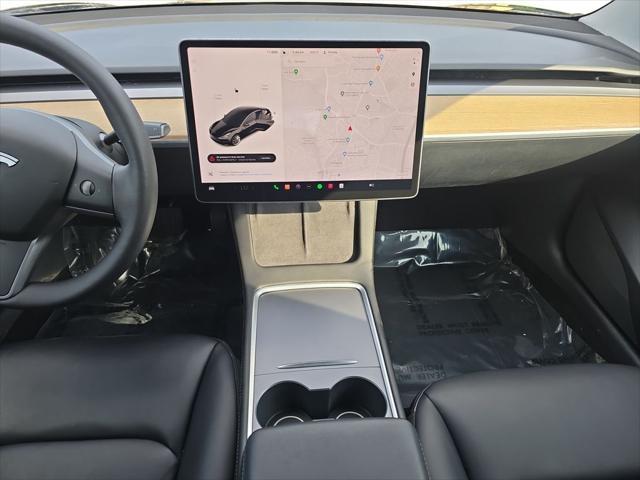 Photo of 2022 Solid Black Tesla Model 3