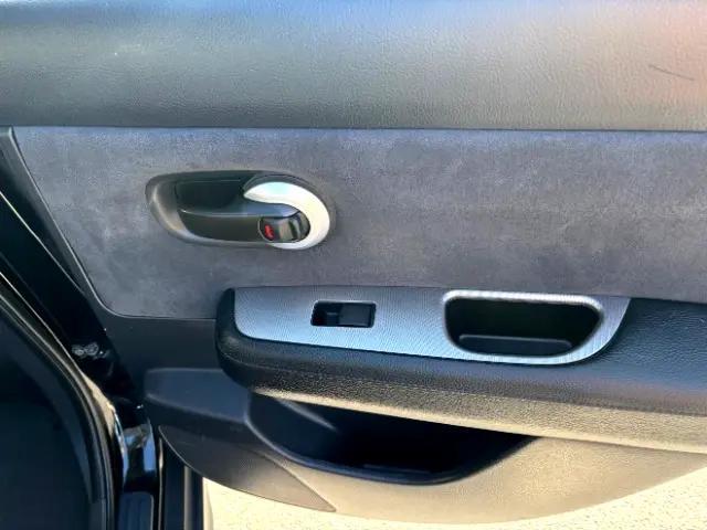Photo of 2008 Super Black Metallic Nissan Versa