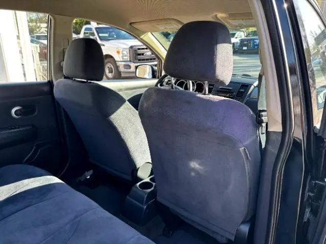 Photo of 2008 Super Black Metallic Nissan Versa