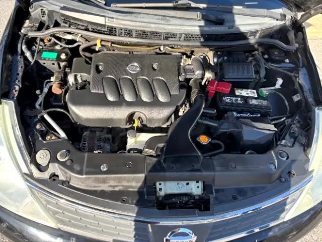 Photo of 2008 Super Black Metallic Nissan Versa