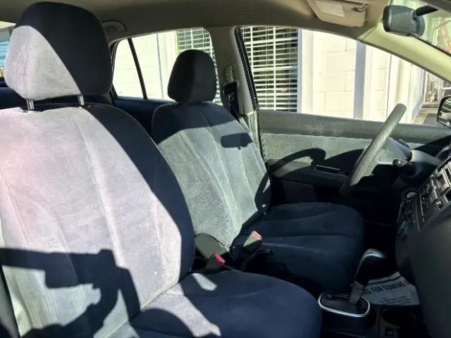 Photo of 2008 Super Black Metallic Nissan Versa