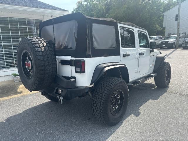 Photo of 2014 Bright White Clearcoat Jeep Wrangler Unlimited