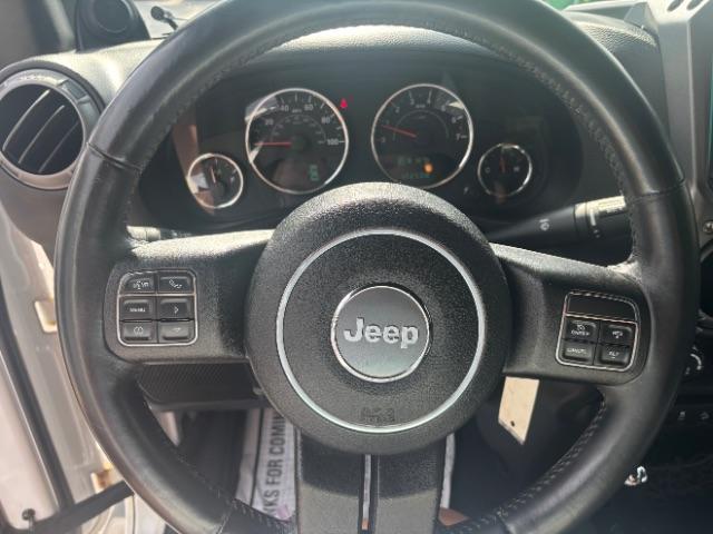 Photo of 2014 Bright White Clearcoat Jeep Wrangler Unlimited