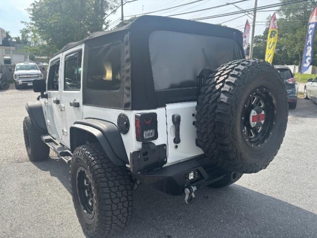 Photo of 2014 Bright White Clearcoat Jeep Wrangler Unlimited