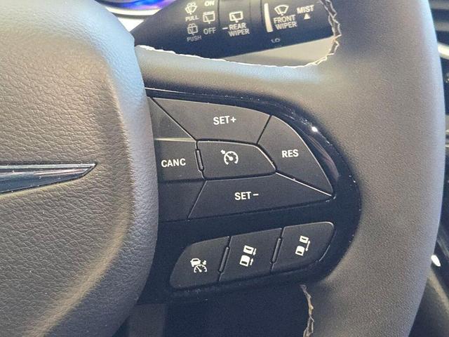 Photo of 2024 Bright White Clearcoat Chrysler Pacifica Hybrid