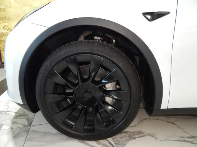 Photo of 2023 Pearl White Multi Tesla Model Y