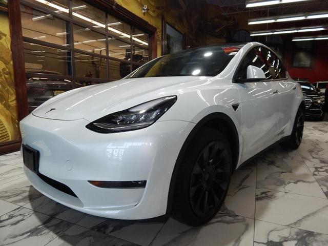 Photo of 2023 Pearl White Multi Tesla Model Y