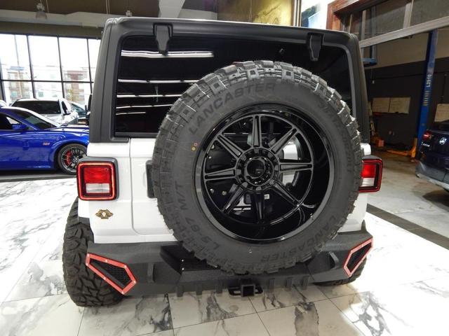 Photo of 2021 Bright White Clearcoat Jeep Wrangler Unlimited