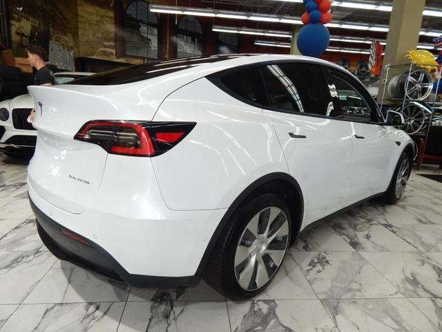 Photo of 2021 Pearl White Multi Tesla Model Y