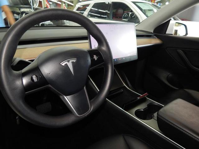 Photo of 2021 Pearl White Multi Tesla Model Y