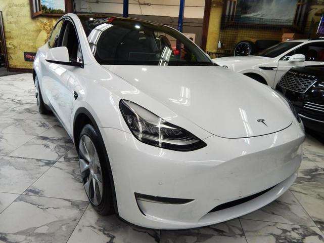 Photo of 2021 Pearl White Multi Tesla Model Y