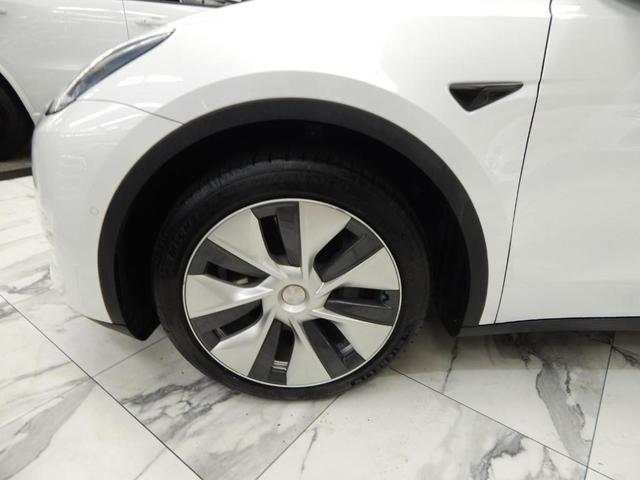 Photo of 2021 Pearl White Multi Tesla Model Y