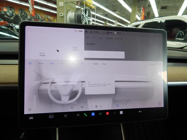 Photo of 2021 Pearl White Multi Tesla Model Y