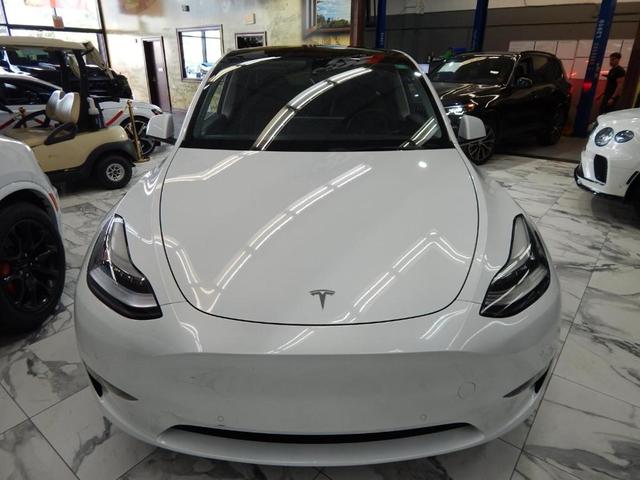 Photo of 2021 Pearl White Multi Tesla Model Y