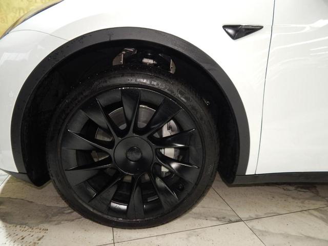 Photo of 2023 Pearl White Multi Tesla Model Y