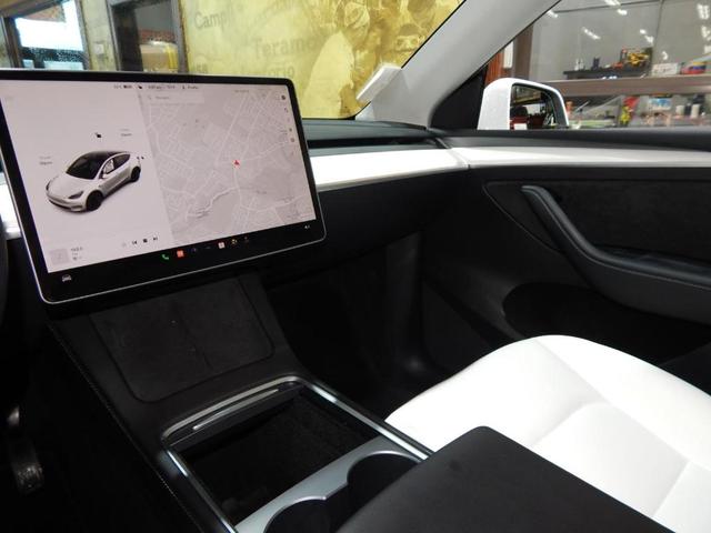 Photo of 2023 Pearl White Multi Tesla Model Y