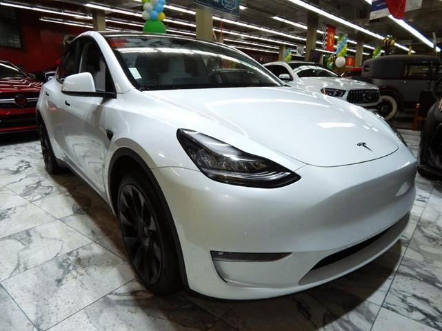 Photo of 2023 Pearl White Multi Tesla Model Y