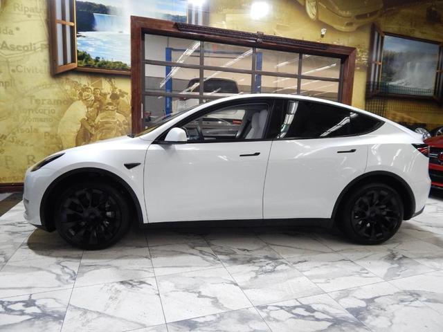 Photo of 2023 Pearl White Multi Tesla Model Y