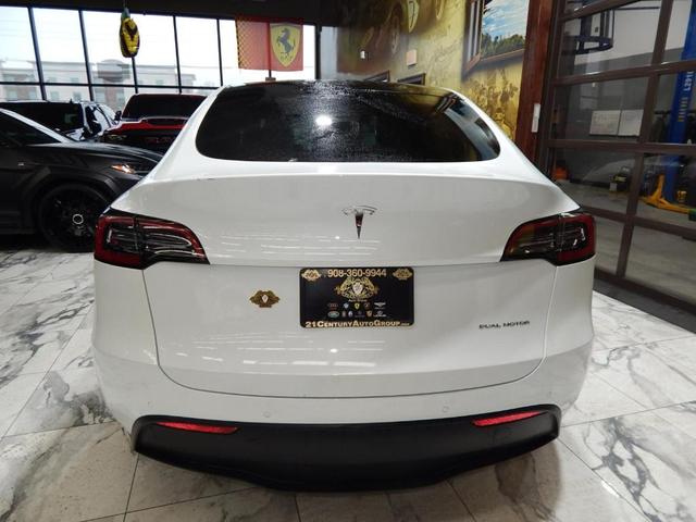Photo of 2023 Pearl White Multi Tesla Model Y