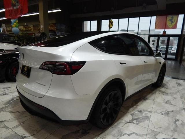 Photo of 2023 Pearl White Multi Tesla Model Y