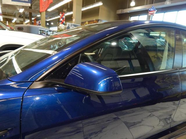 Photo of 2022 Deep Blue Metallic Tesla Model 3
