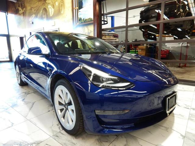 Photo of 2022 Deep Blue Metallic Tesla Model 3