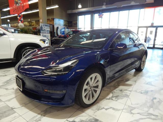 Photo of 2022 Deep Blue Metallic Tesla Model 3