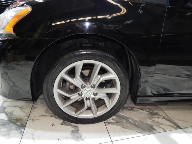Photo of 2014 Super Black Nissan Sentra