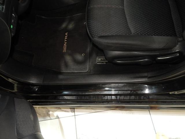 Photo of 2014 Super Black Nissan Sentra