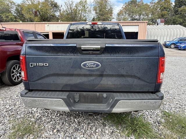 Photo of 2016 Ruby Red Metallic Tinted Clearcoat Ford F-150